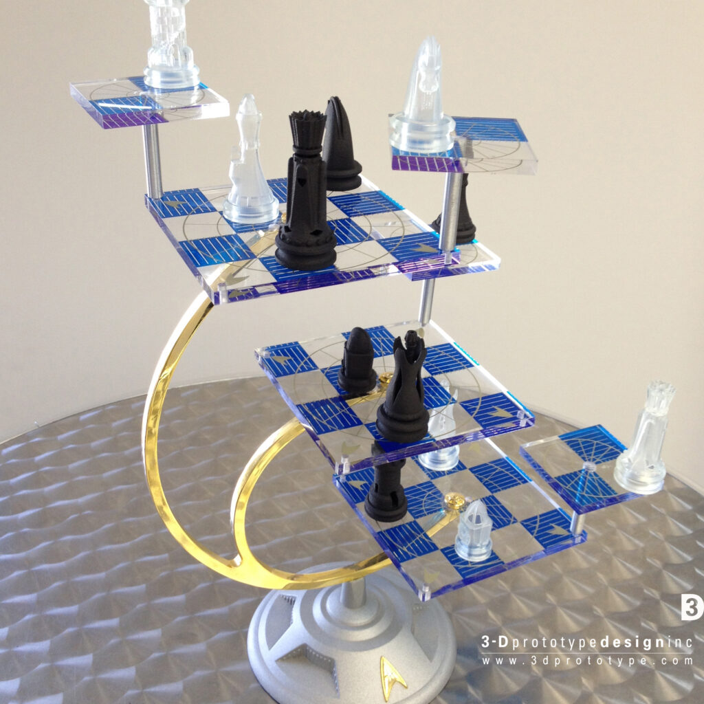 Chess pieces 3D printed in different materials displayed on a Star Trek themed chessboard, showcasing SLS, SLA, PolyJet, and FDM technologies